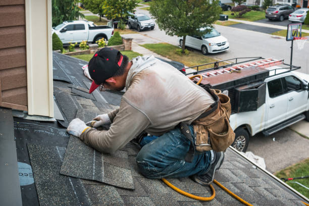 Professional Roofing technician working in Fancher, NY